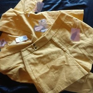 Long sleeve blazer and shorts.